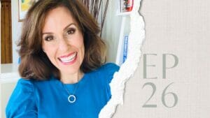 woman with brown hair in blue blouse smiling, text Ep 26