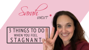 Picture of Sarah and the Sarah Uncut background for Sarah Uncut Episode 21 background with 3 fingers up