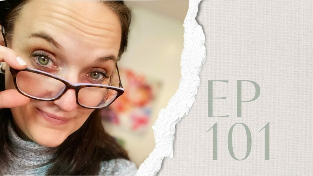 woman holding glasses slightly away from face look