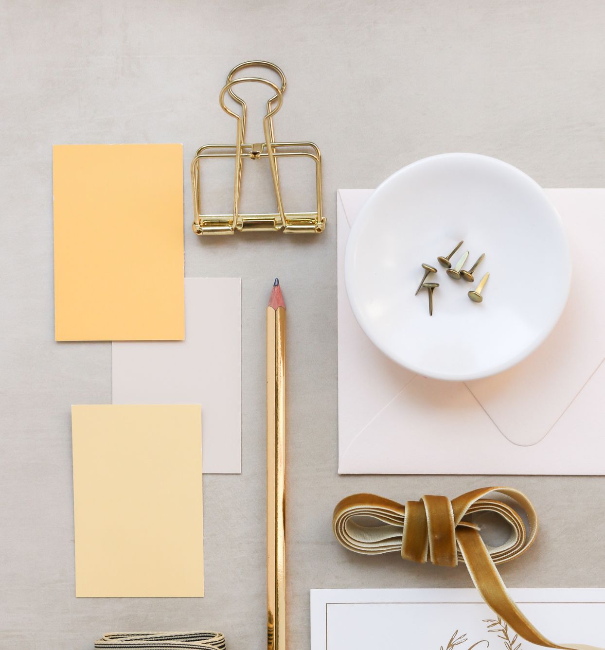 Table Desktop with pencil, large paper clip, notes and other supplies