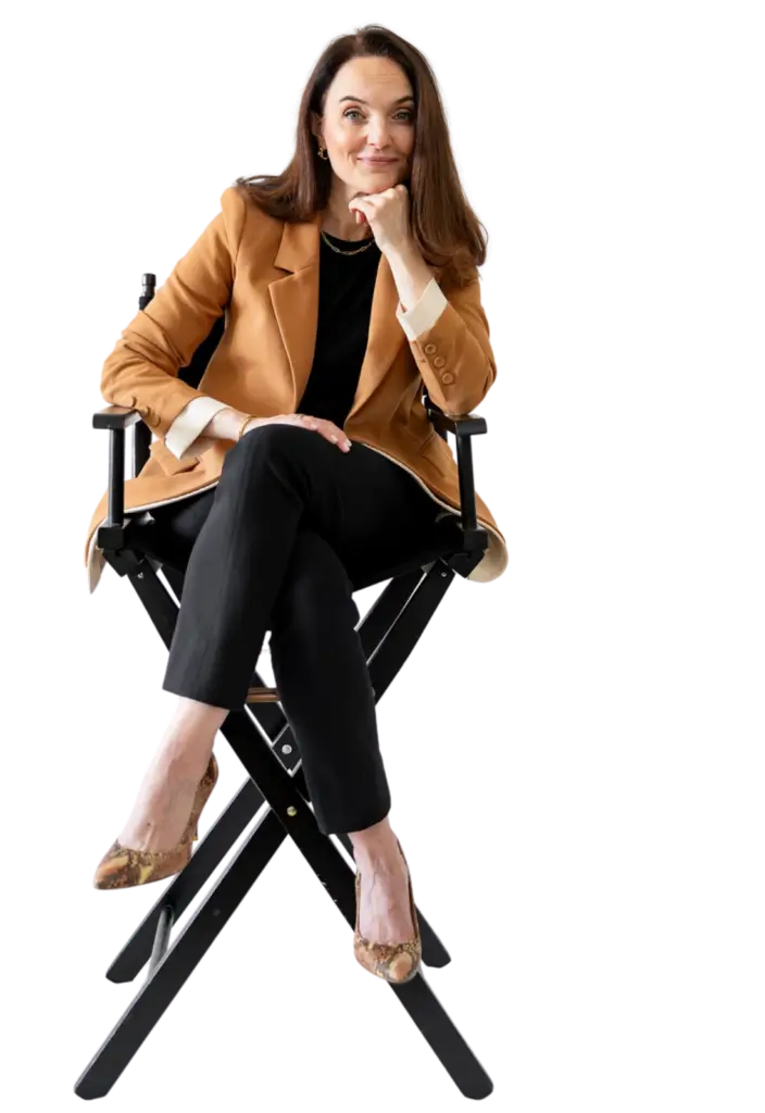 Sarah Walton business coach and speaker sitting in a directors chair